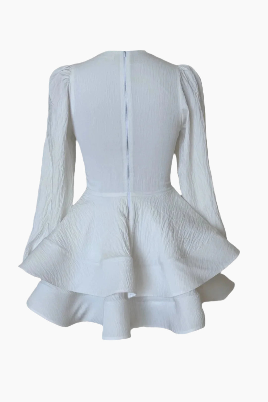 White dress with ruffled end