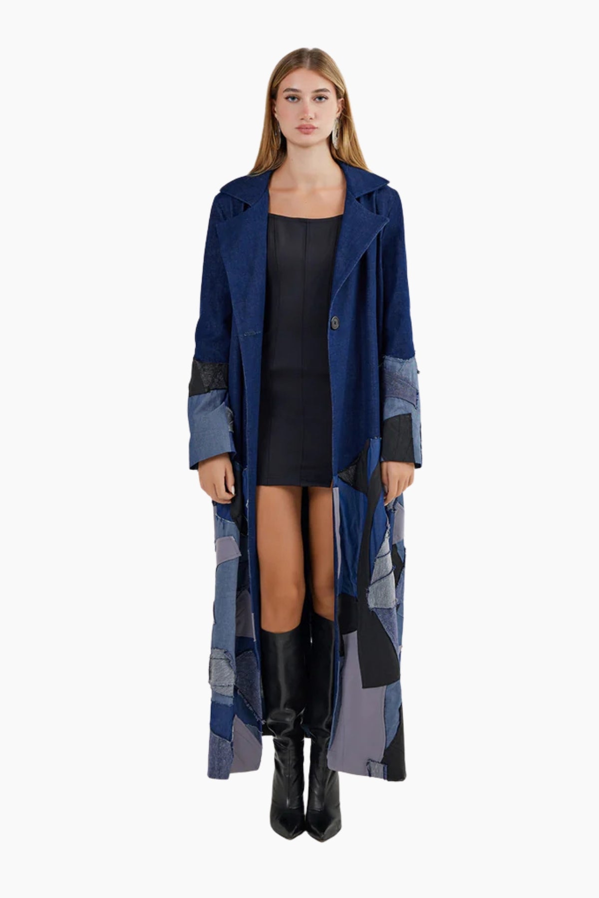 Woman wearing a long, patterned blue coat