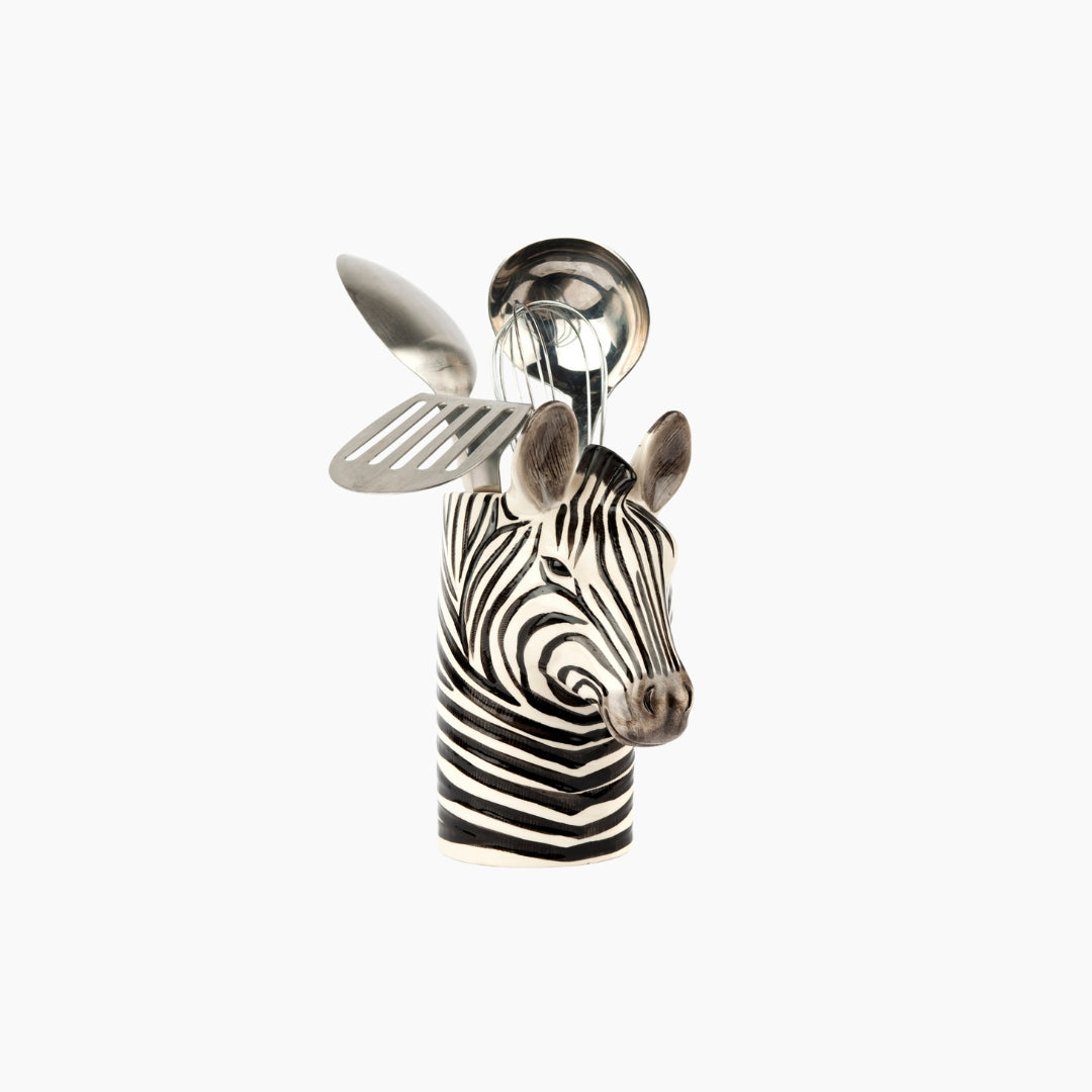 Decorative zebra head with a spoon and spatula