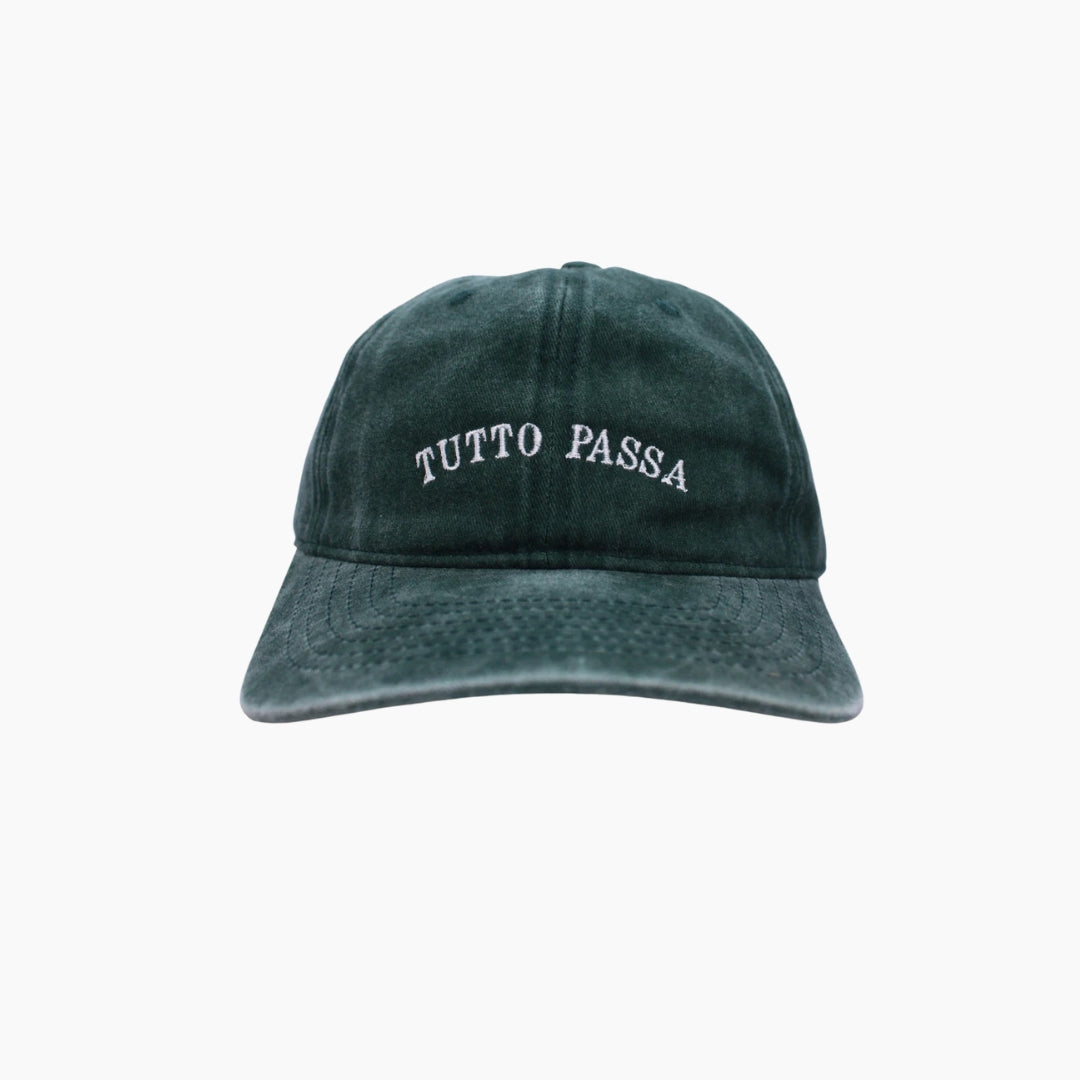 Green cap with 'Tutto Passa' text