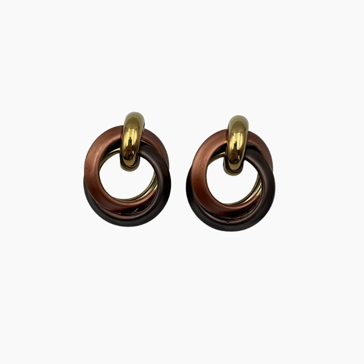 Pair of earrings with gold and brown circular design