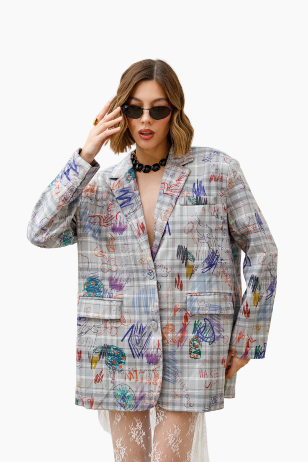 Woman wearing a colorful patterned blazer