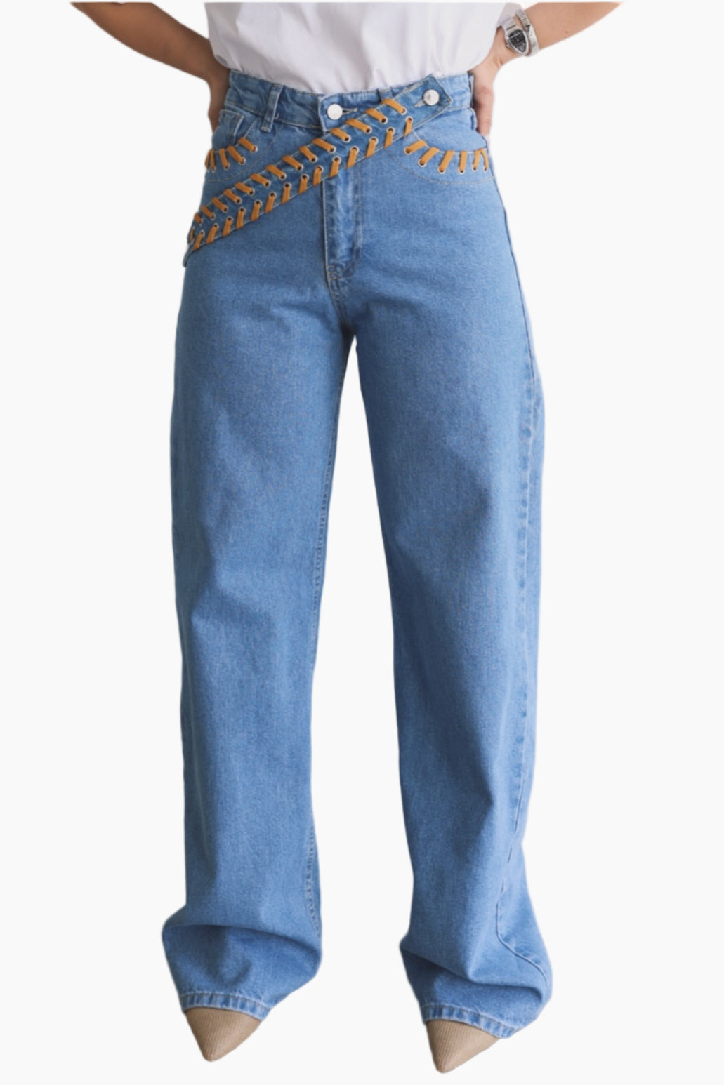 Blue jeans with decorative belt on a white background