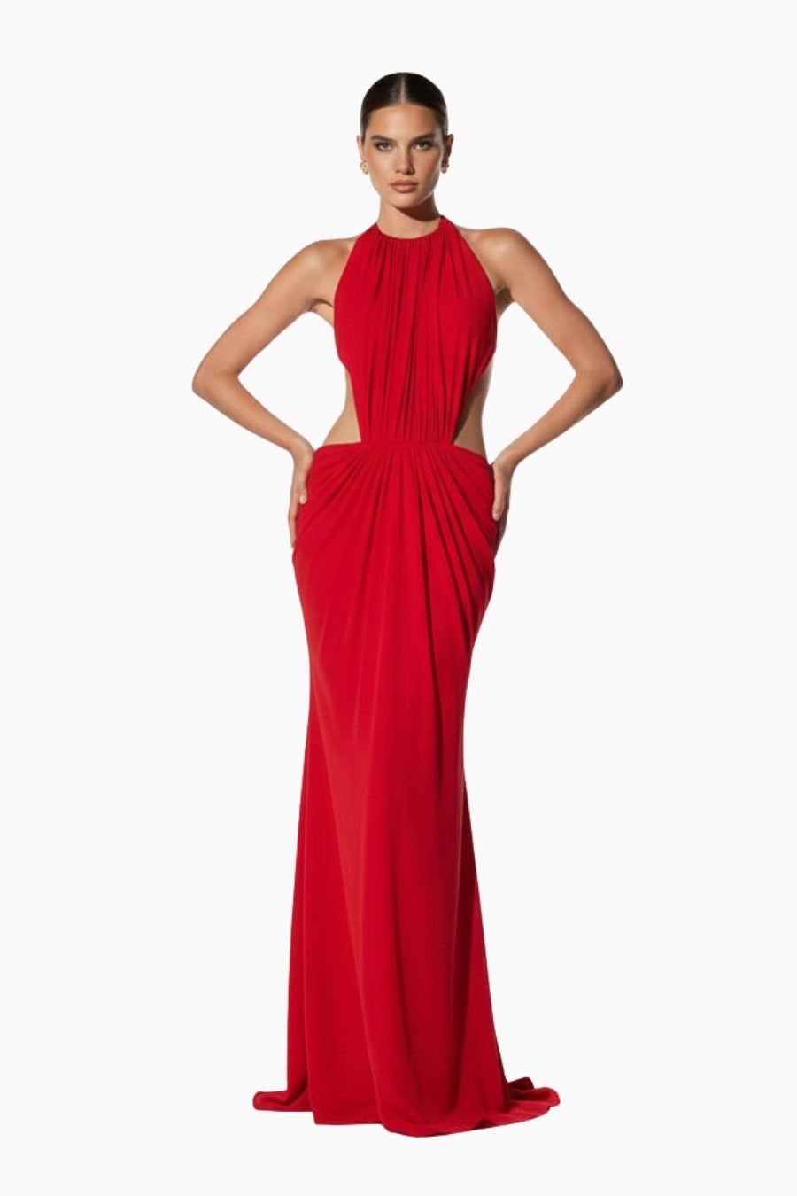 Woman wearing a maxi red evening gown with side cuts
