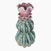 A larger multi-colored stoneware vase that adds a dynamic and cheerful touch to your interior.