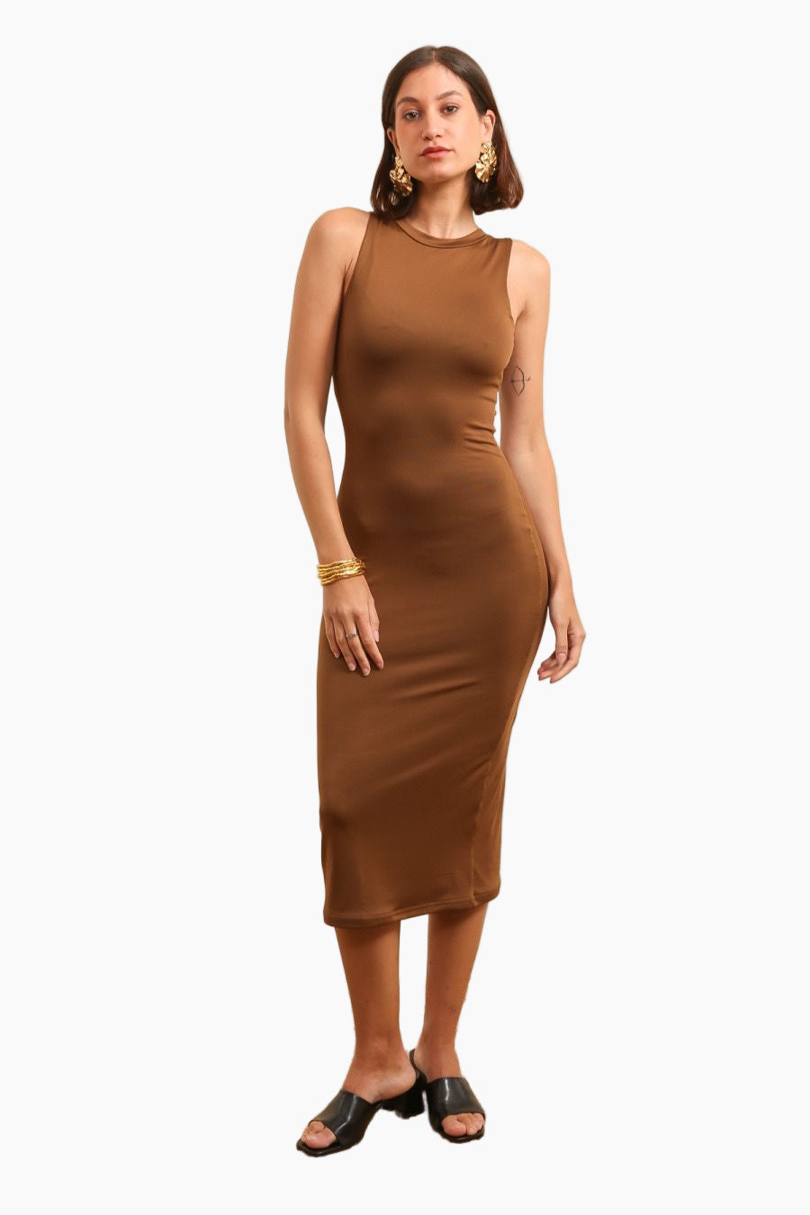 Woman wearing a brown sleeveless dress 