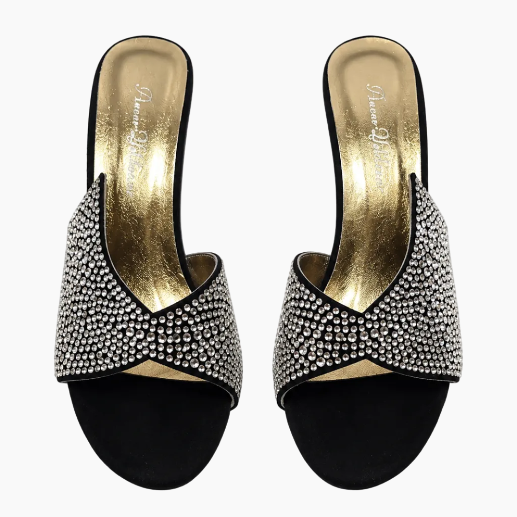 A pair of women's black slide sandals embellished with silver rhinestones across the straps, featuring a black velvet-like toe section and a metallic gold insole. The brand name 'Alessio Rossi' is printed on the gold insole.