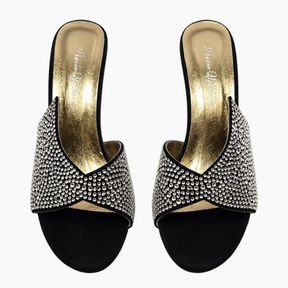 A pair of women's black slide sandals embellished with silver rhinestones across the straps, featuring a black velvet-like toe section and a metallic gold insole. The brand name 'Alessio Rossi' is printed on the gold insole.