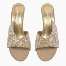A pair of women's slide sandals with metallic gold insoles and straps heavily embellished with small clear rhinestones, shown from a top-down view on a white background.