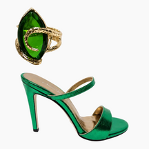 A metallic emerald green high-heeled sandal with a slim strap and open toe, shown alongside a matching green and gold ring on a clean white background.