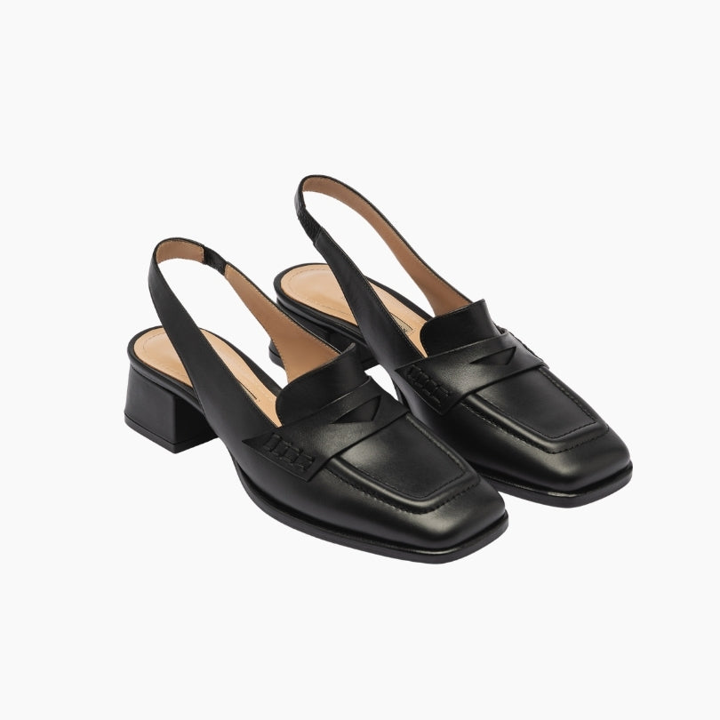Pair of black loafers with a block heel 