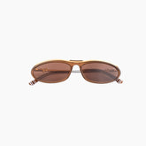 Brown sunglasses with gold frame on a white background