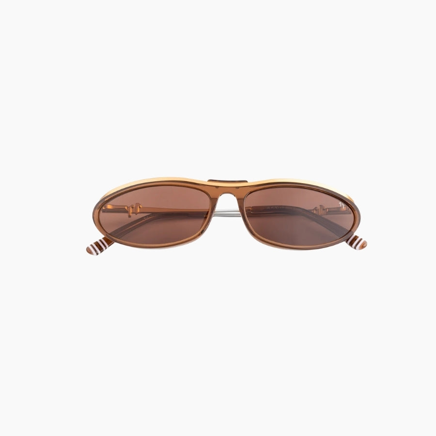 Brown sunglasses with gold frame on a white background