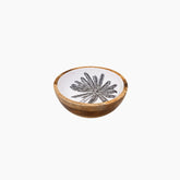 Decorative bowl with a floral design on a white background