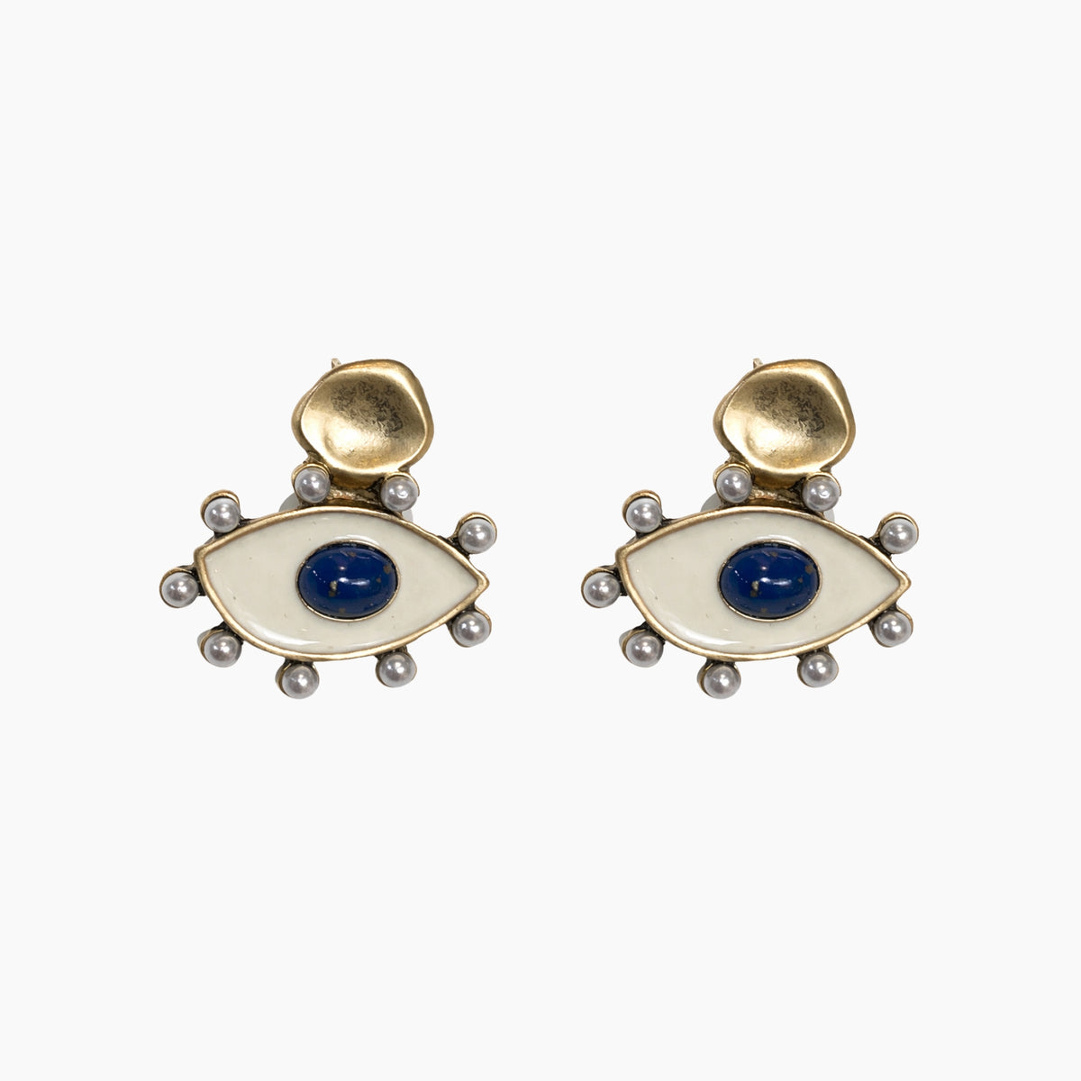 Pair of earrings with eye design on a white background