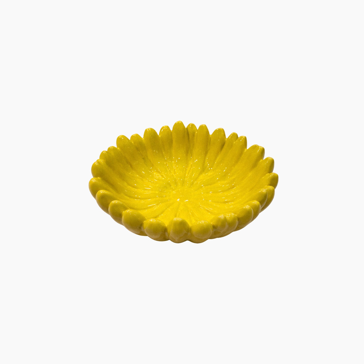 Yellow decorative bowl with a textured surface on a white background