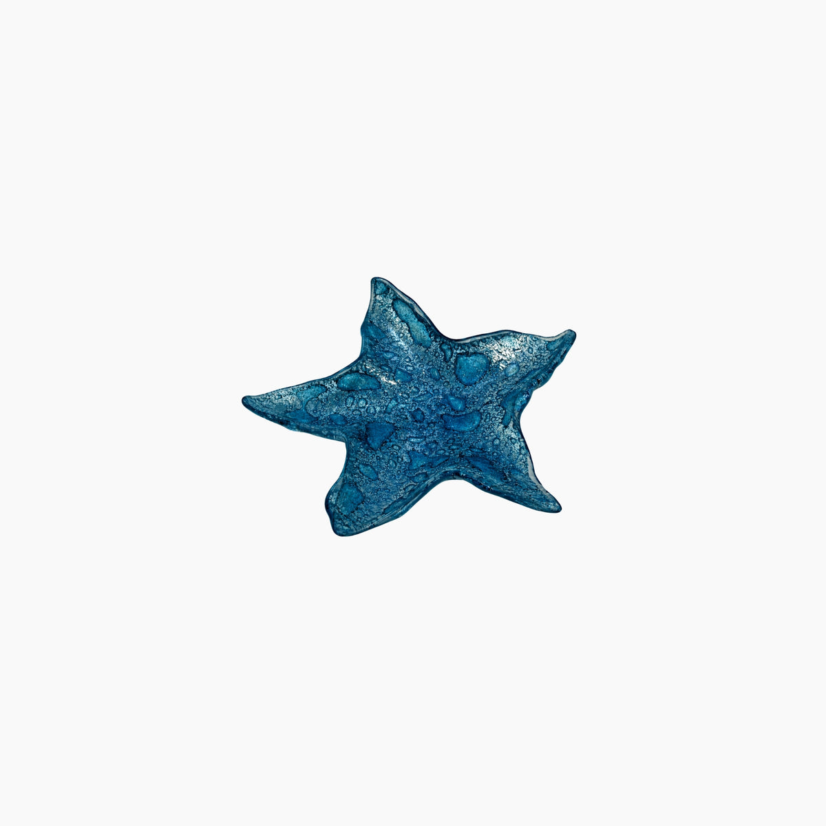 Blue star-shaped object on a white background