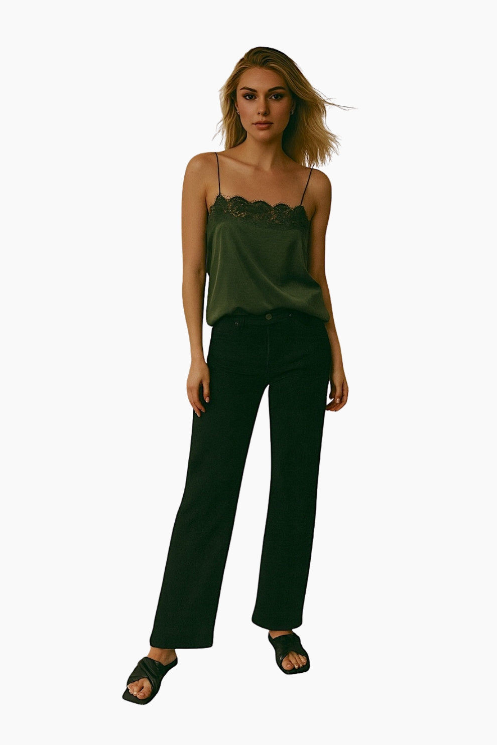 Woman wearing a green top and black pants