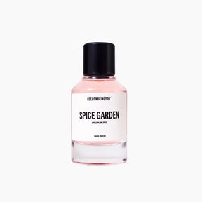 Perfume bottle labeled 'Spice Garden' by KEEPONBEINGYOU on a white background