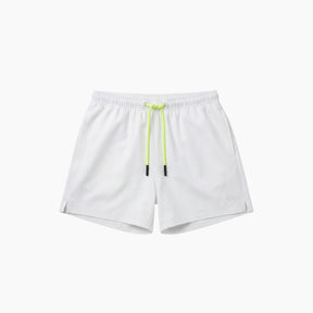 White shorts with a neon green drawstring on a white background