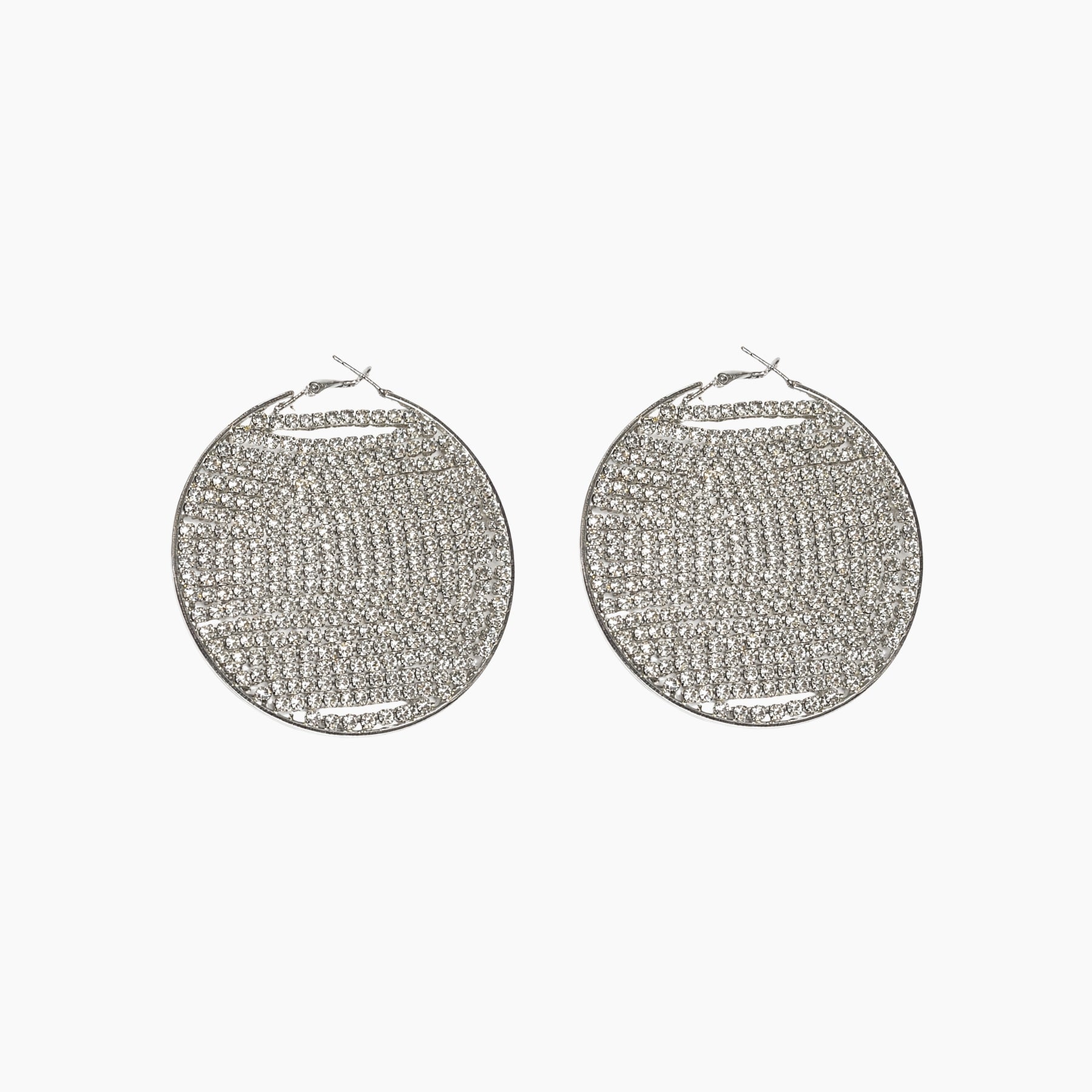 Pair of silver hoop earrings on a white background