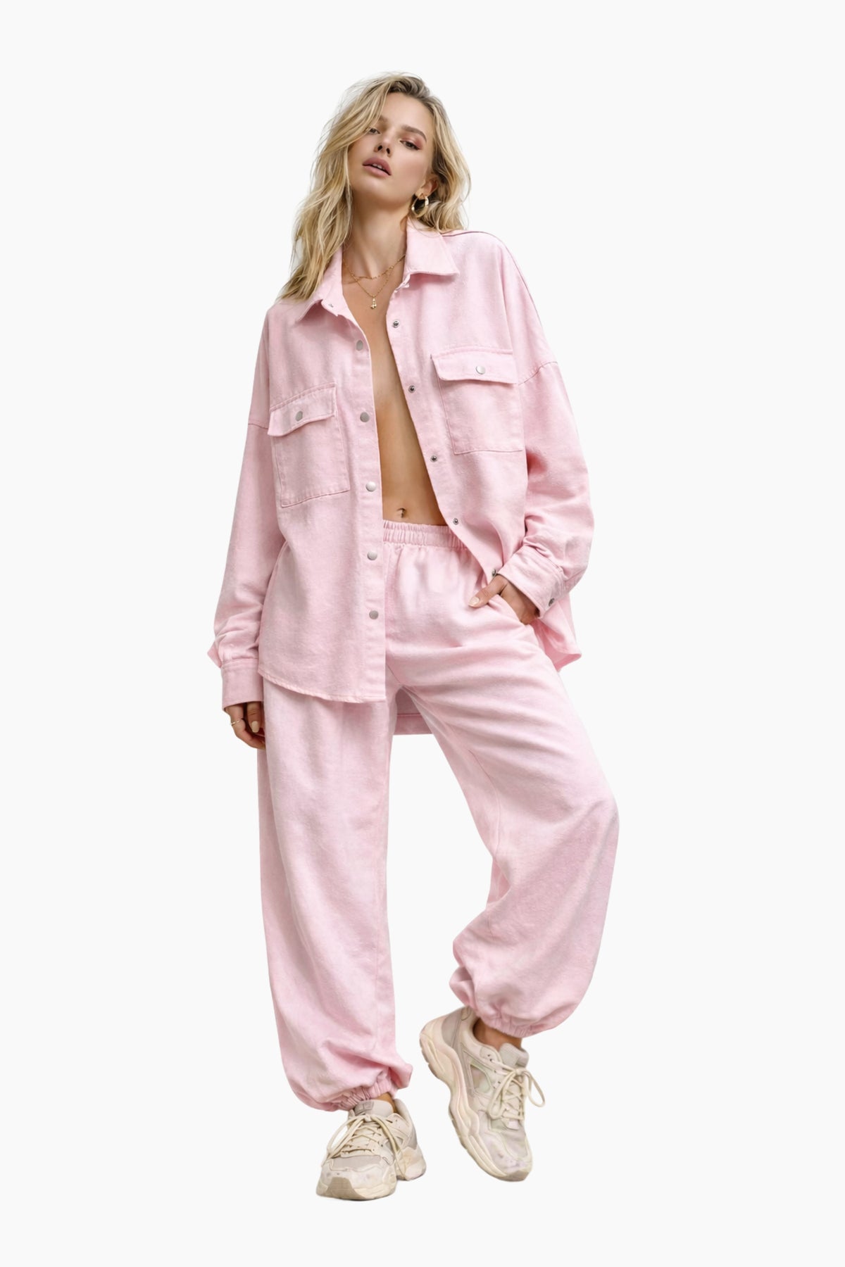 Woman wearing a pink outfit on a white background