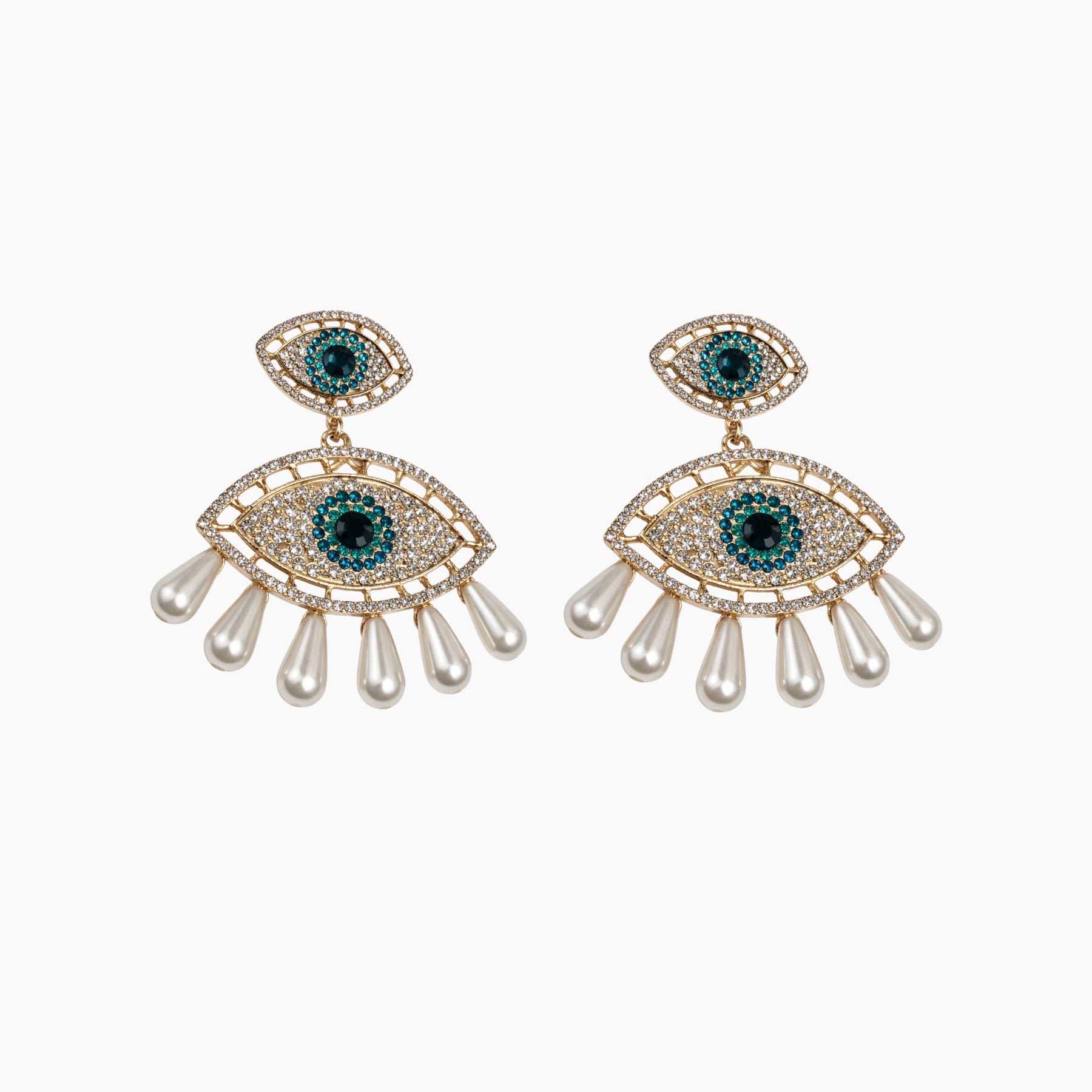 Pair of eye-shaped earrings with gemstones and pearl-like elements on a white background