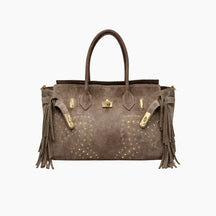 Brown handbag with gold studs and fringes on a white background