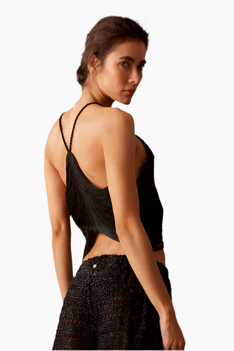 Woman wearing a black halter top 