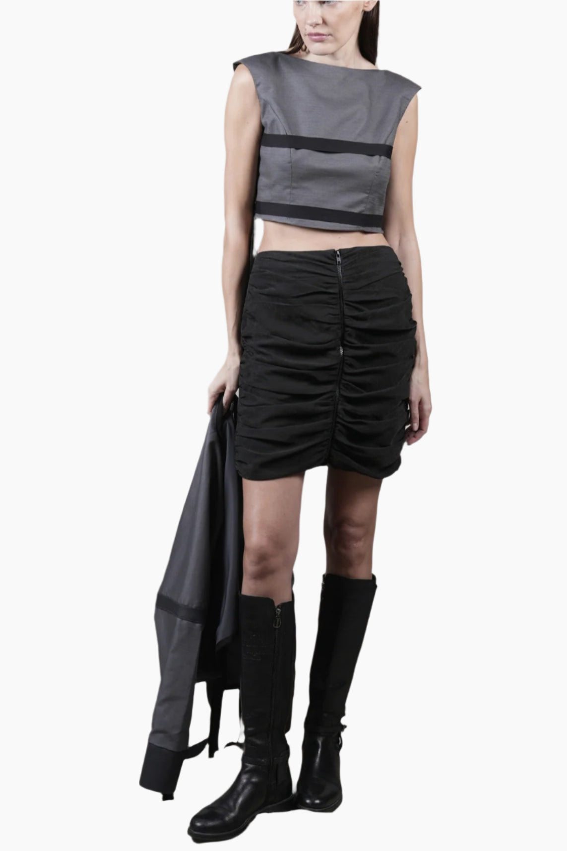 backless sleeveless top featuring delicate ribbon detailing, a stylish cropped front and an elegantly longer back.