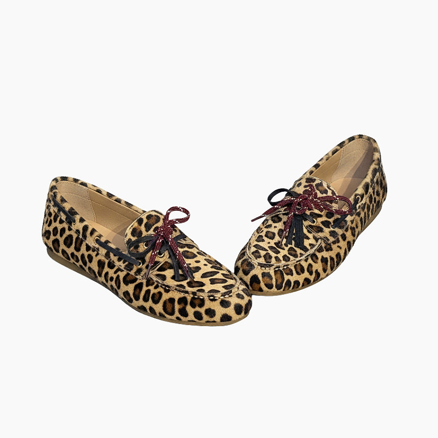leopard loafer with a burgundy bow tie upfront 