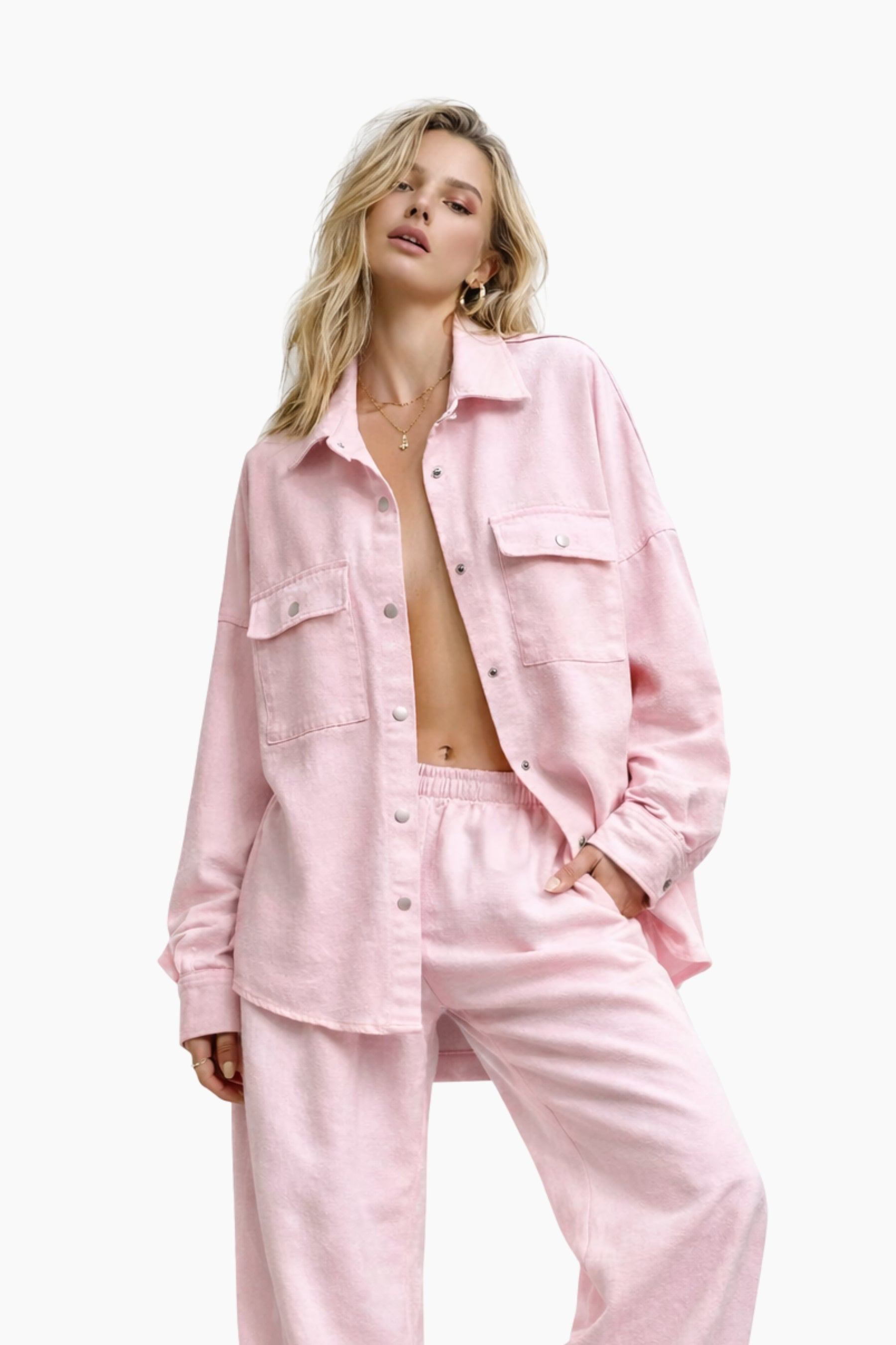 Woman wearing a pink outfit on a white background