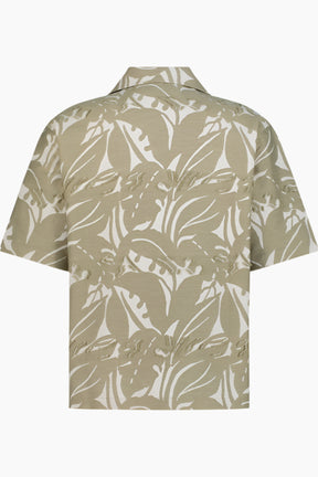 Beige shirt with white leaf pattern 