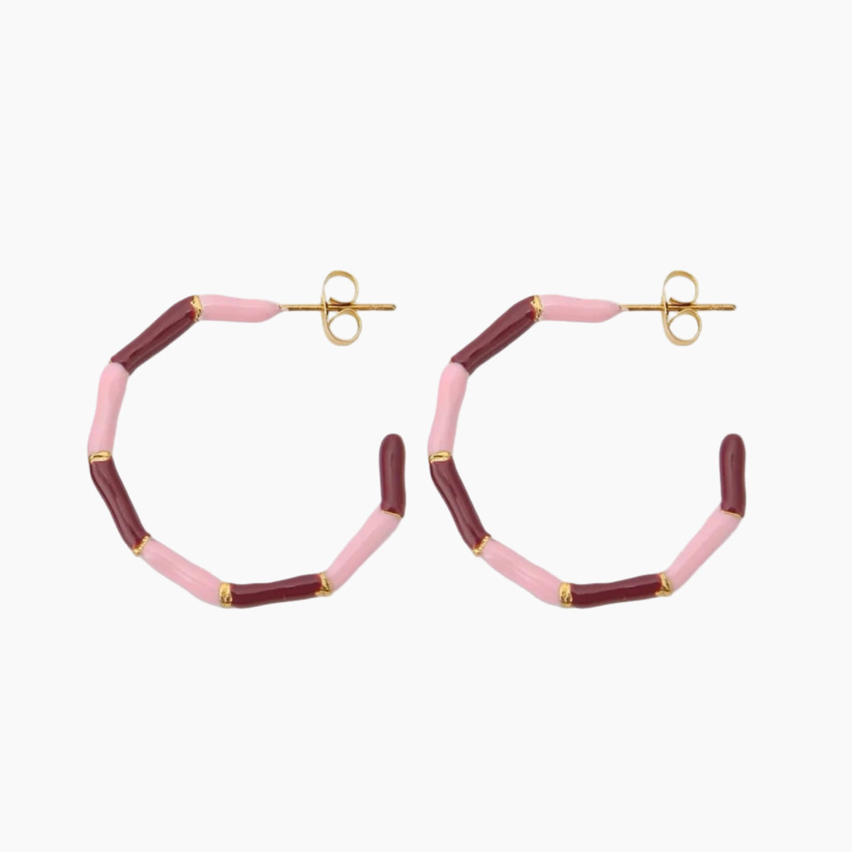 Hoop earrings with pink and red gradient on a white background