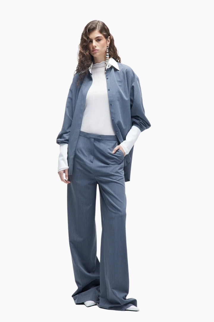 Woman wearing a blue outfit 