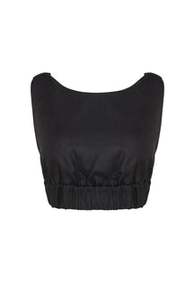 Black crop top on a white background