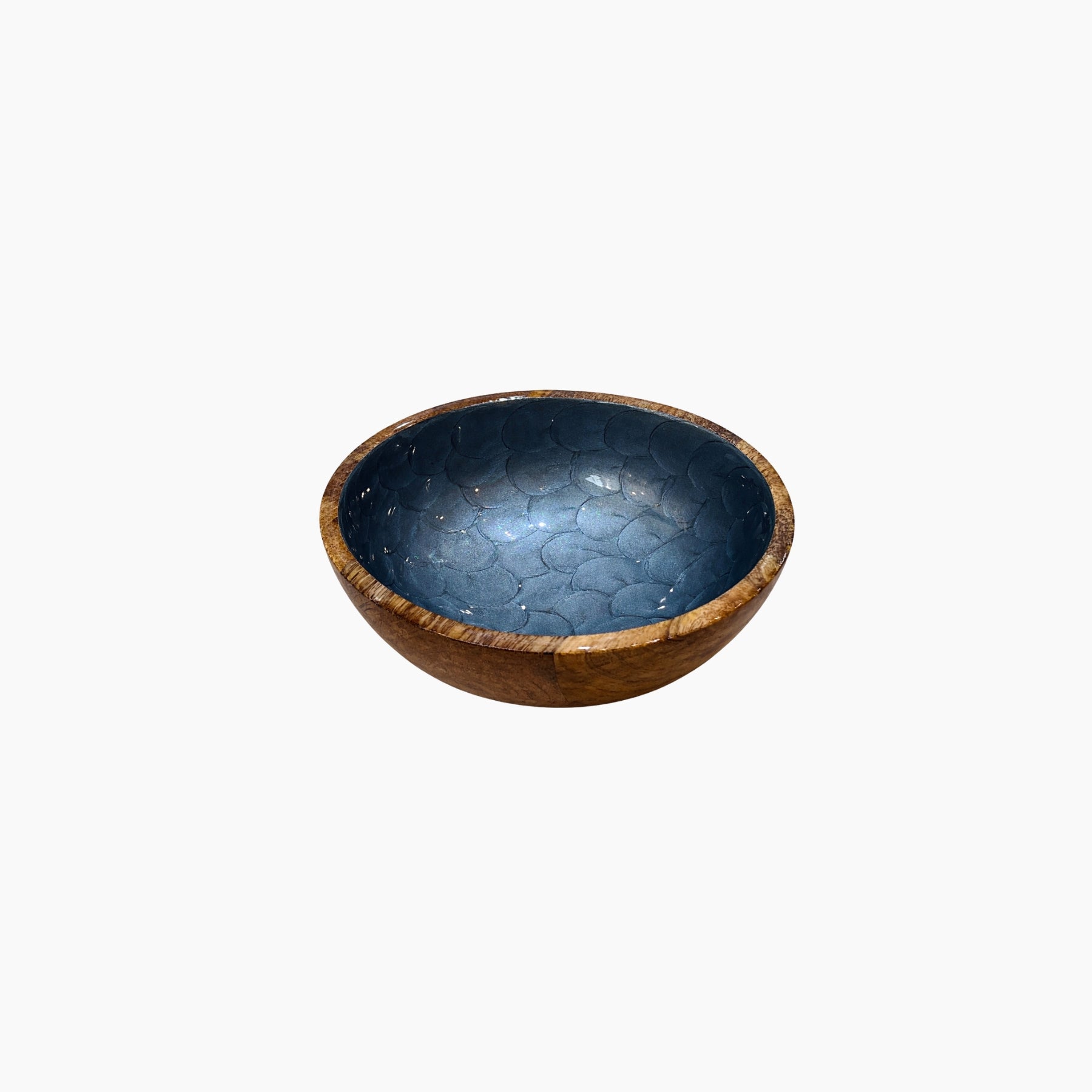 Ceramic bowl with textured blue interior and brown exterior on a white background