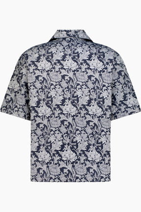 back shot of a Floral patterned shirt in light bleu and navy