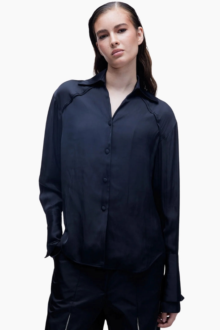 Person wearing a black outfit 