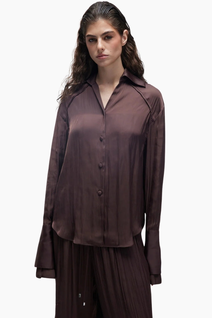 Woman wearing a brown outfit