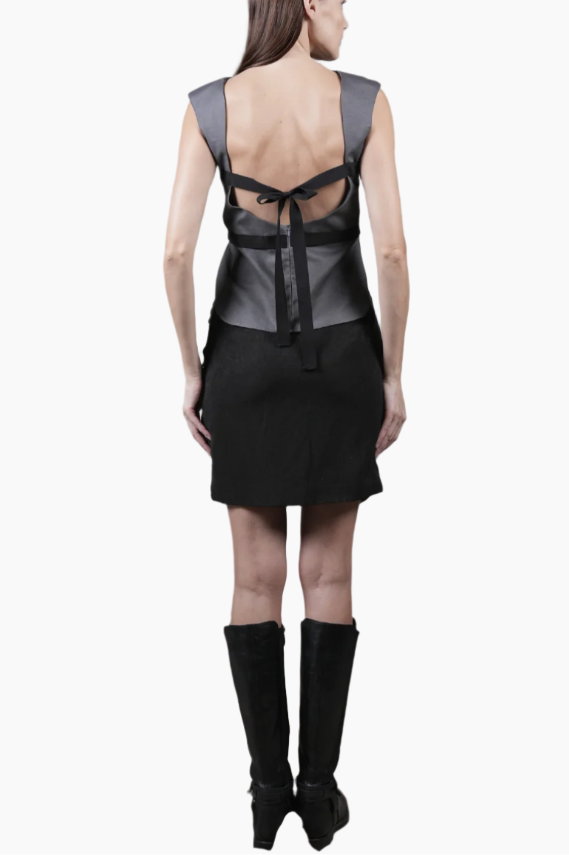 backless sleeveless top featuring delicate ribbon detailing, a stylish cropped front and an elegantly longer back.