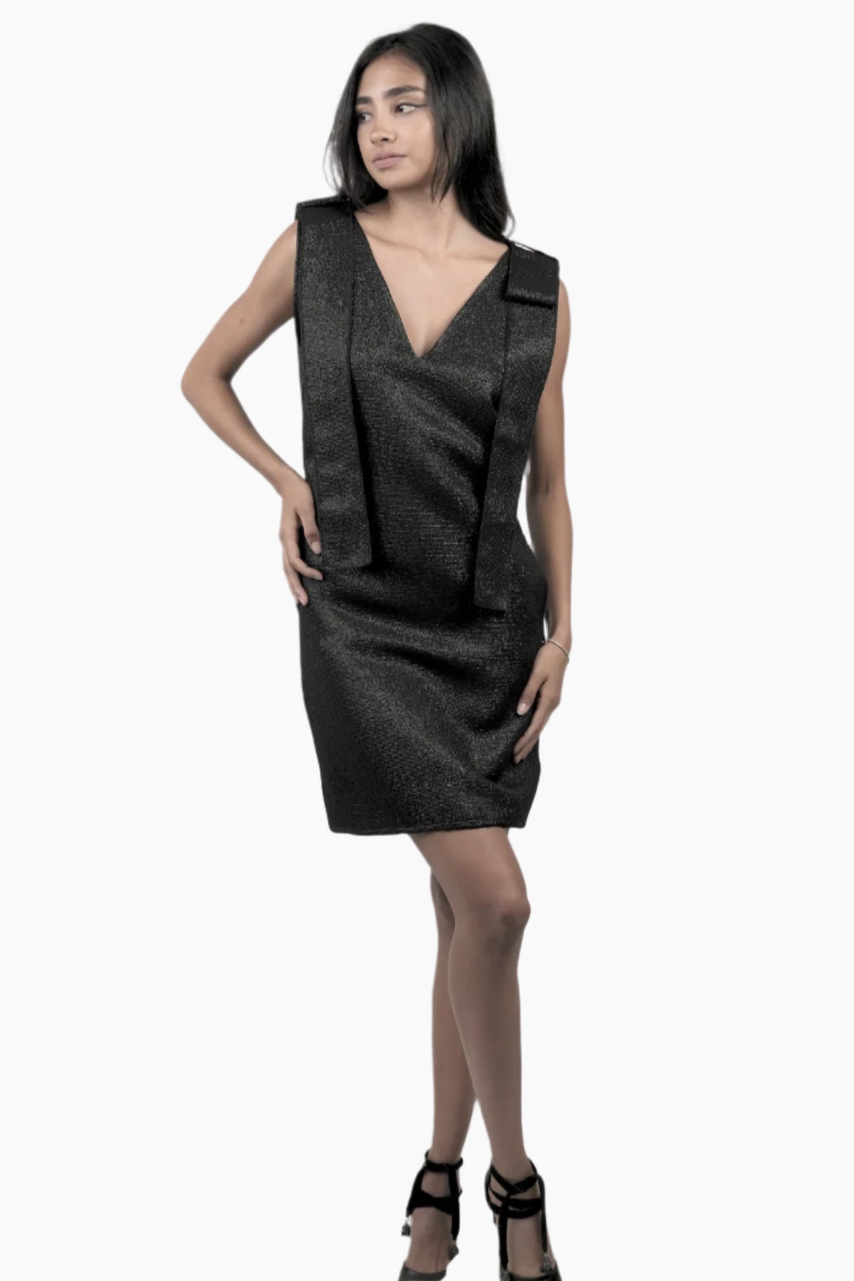 A comfortable, flattering V-neck dress adorned with charming bow shoulder straps.