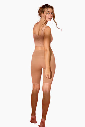Woman wearing beige shapewear 