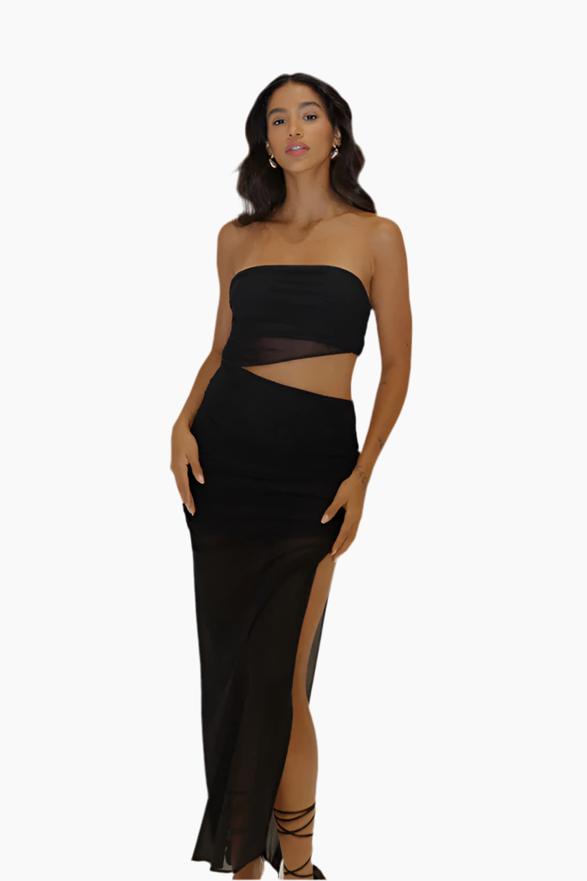 Woman wearing a black strapless gown with cut-out design.