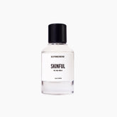 Skinful perfume bottle on a white background