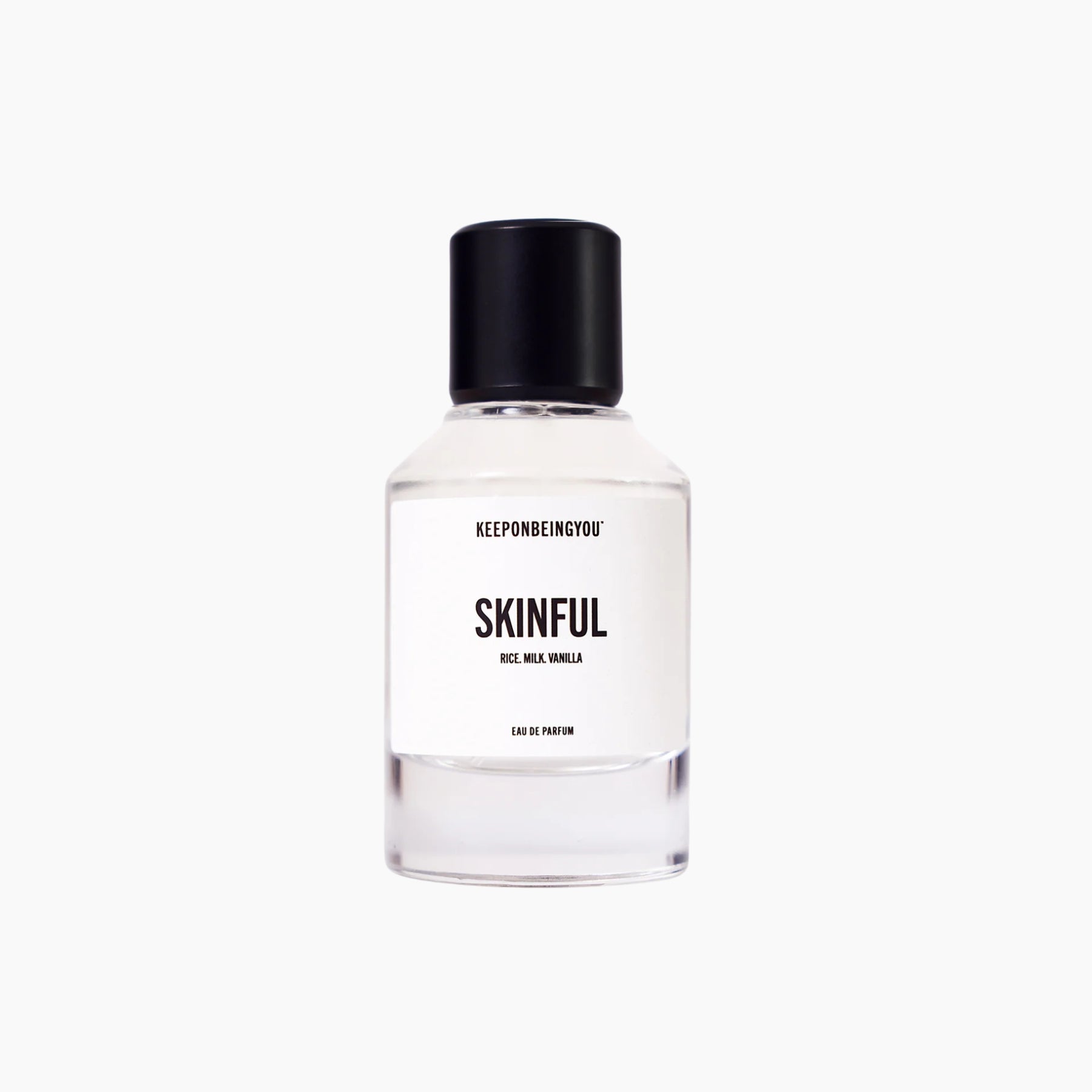 Skinful perfume bottle on a white background