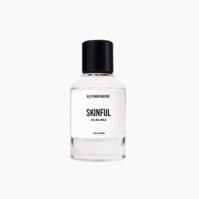 Skinful perfume bottle on a white background
