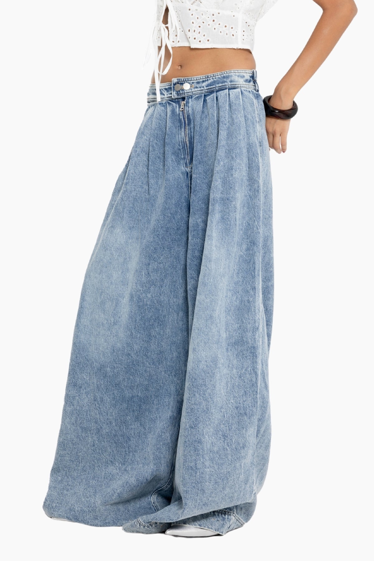Blue denim wide-leg pants worn by a person 