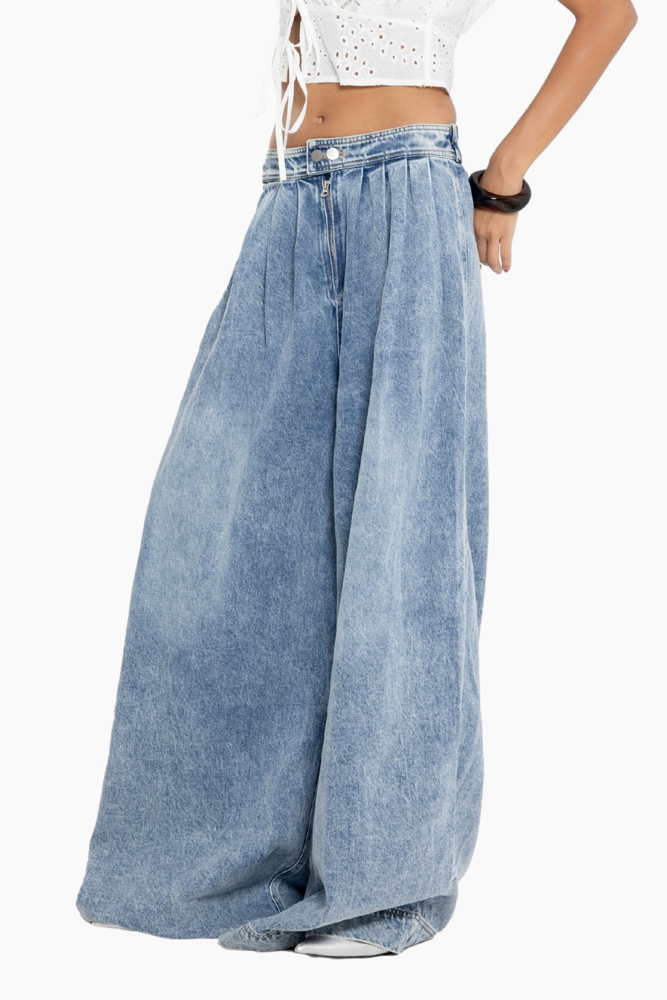 Blue denim wide-leg pants worn by a person 