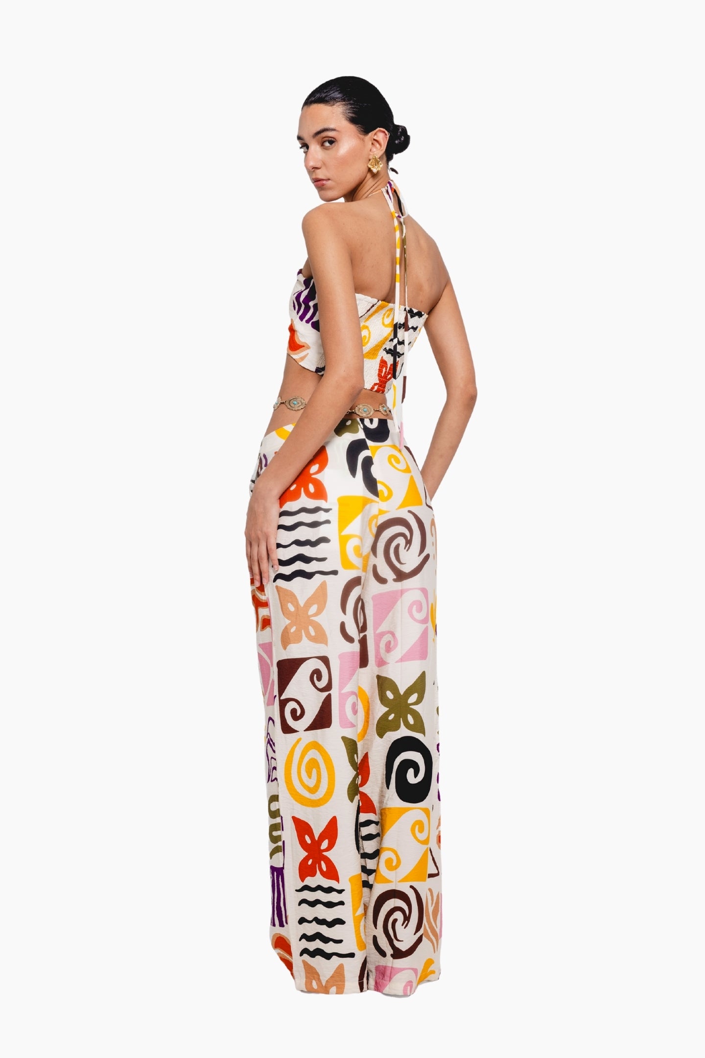 Woman wearing a colorful patterned dress 